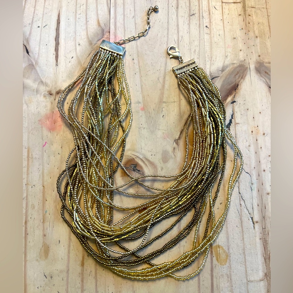 Gold multi strand statement necklace